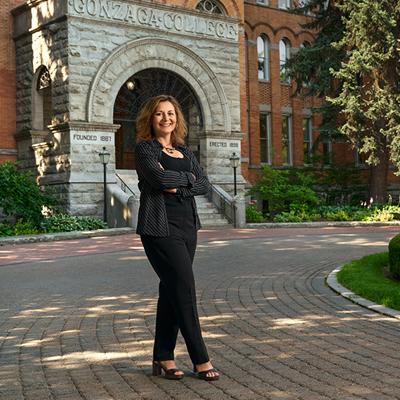 President Passerini in front of College Hall.