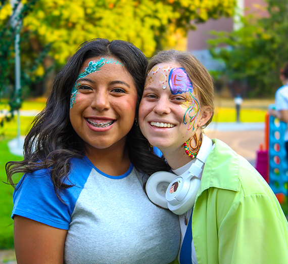 Two girls smiling,