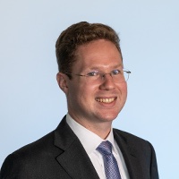 An image of a man smiling