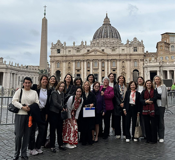 A group of women standing in Vatican City