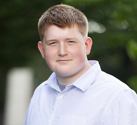 A man in white collared shirt