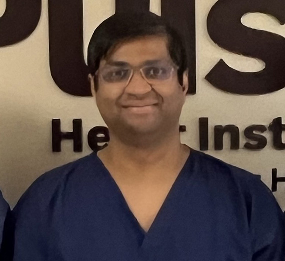 Dr. Mohit Jain wearing scrubs 