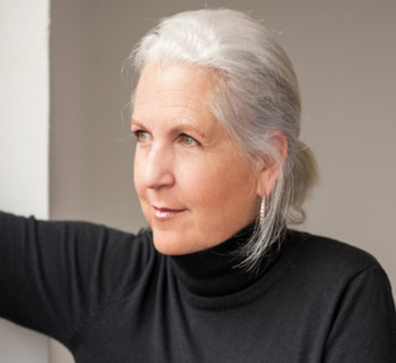 Cardinal Michael Czerny standing at a podium. 