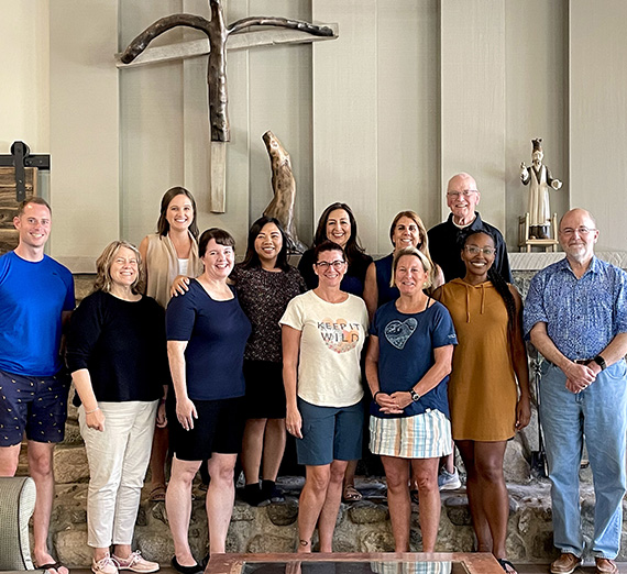 Group of students standing together at a Benedictine Monastery