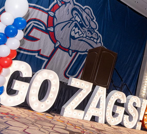 A "Go Zags" sign at the alumni party in Vegas.