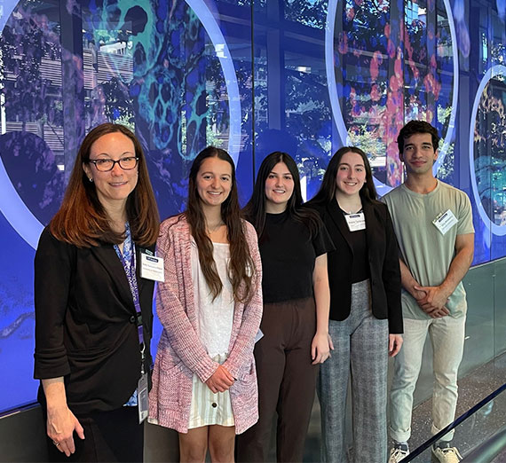 From left to right: Shelly Sakiyama-Elbert, UW Medicine Vice Dean for Research Graduate Education, with GU students Claire Charvet, Emma Spiegel, Alexis Terterov, Shafiq Moltafet.