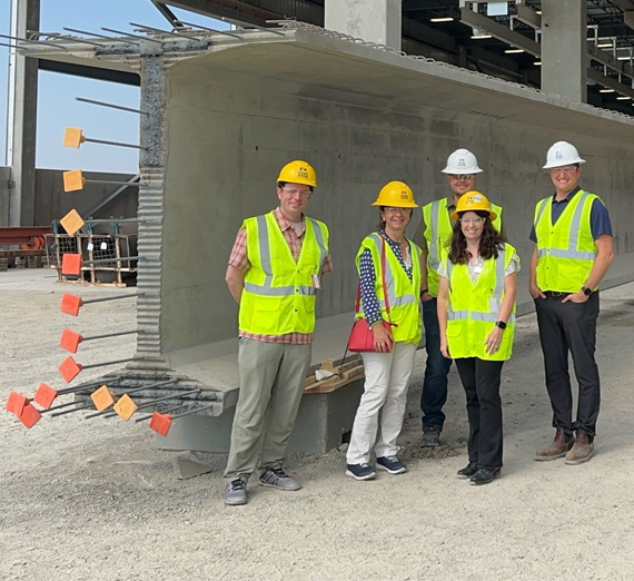 Gonzaga’s 1950 boxing champions are welcomed home under a banner celebrating their national title.