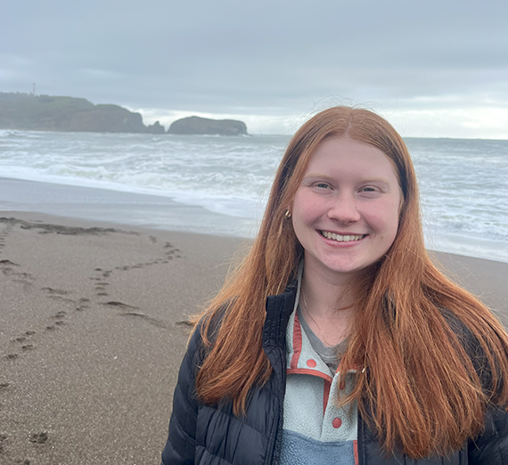 student on ocean beach