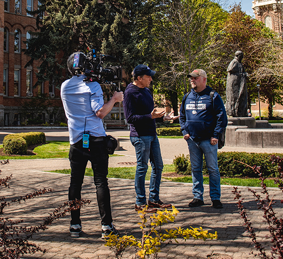 Video crew films Mike Rowe with Rick Clark 