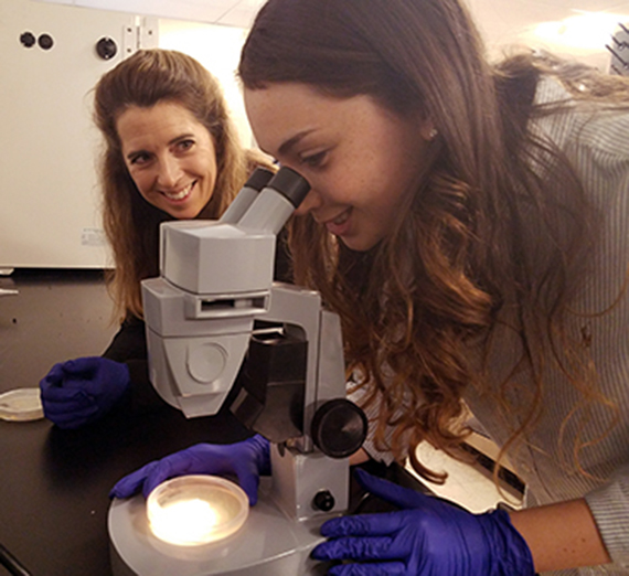 Gonzaga researcher with student.