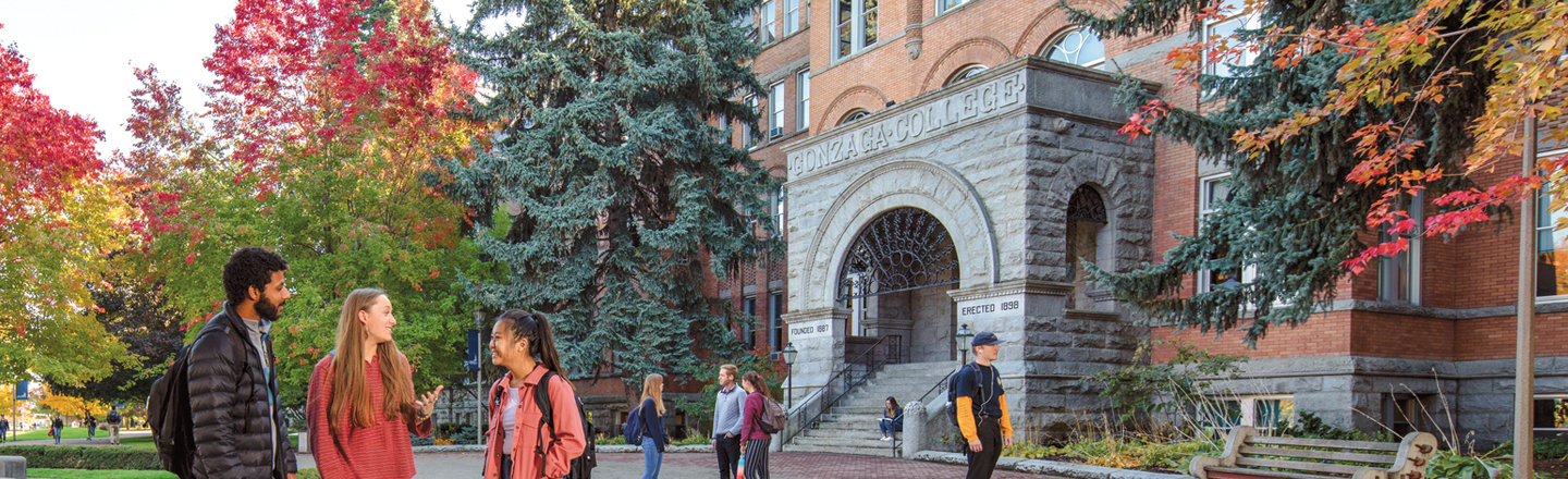 Students gather in fron of College Hall.
