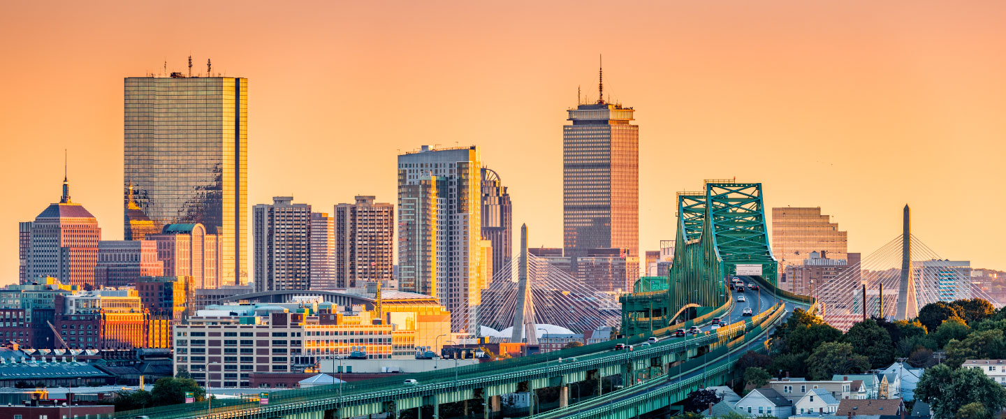 Tobin bridge, Zakim bridge and Boston skyline panorama at sunset.