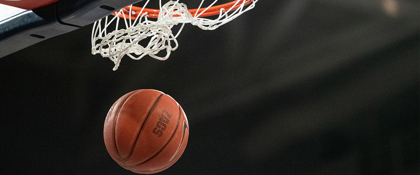 'ZAGS' printed on a basketball falling from a hoop 
