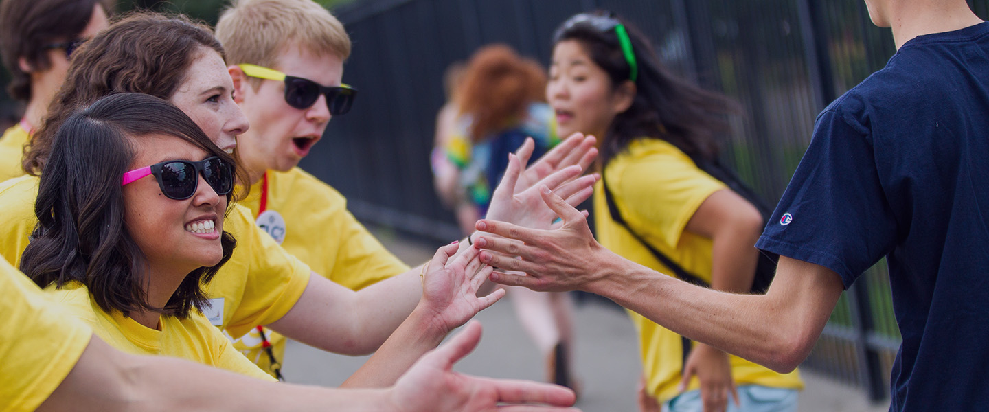 High fives at orientation